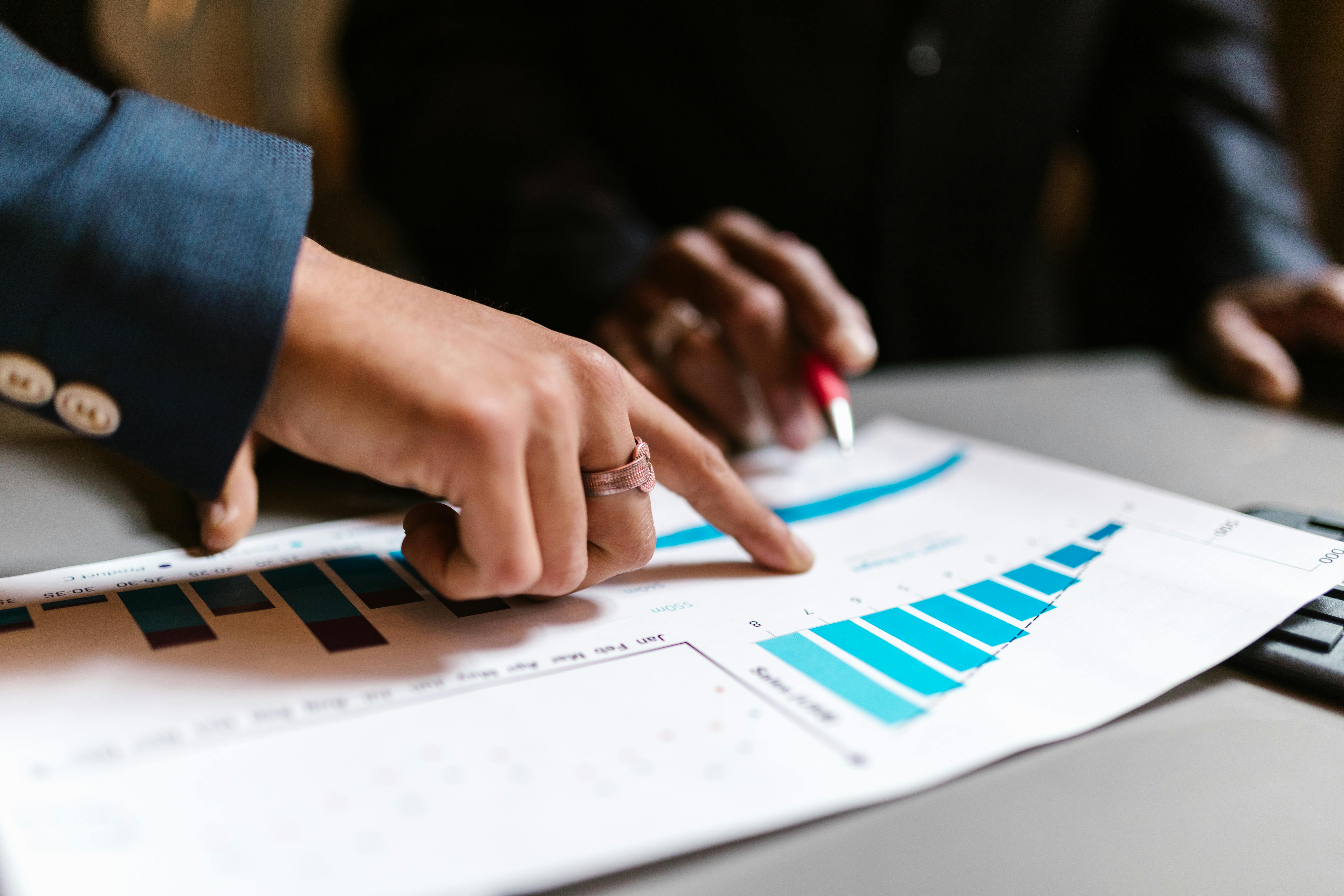 Professionals analyzing financial records