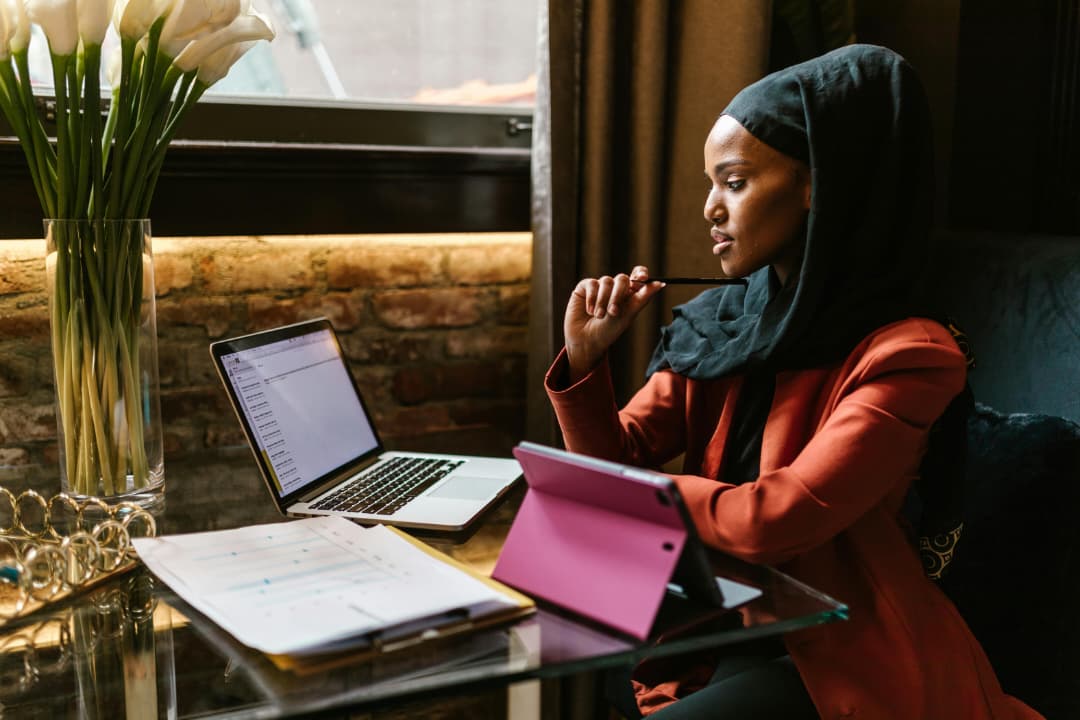 A woman looking over her financial records